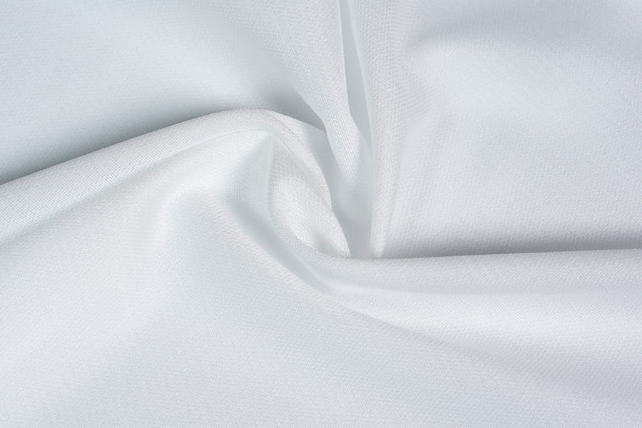 Poliester fusible interlining